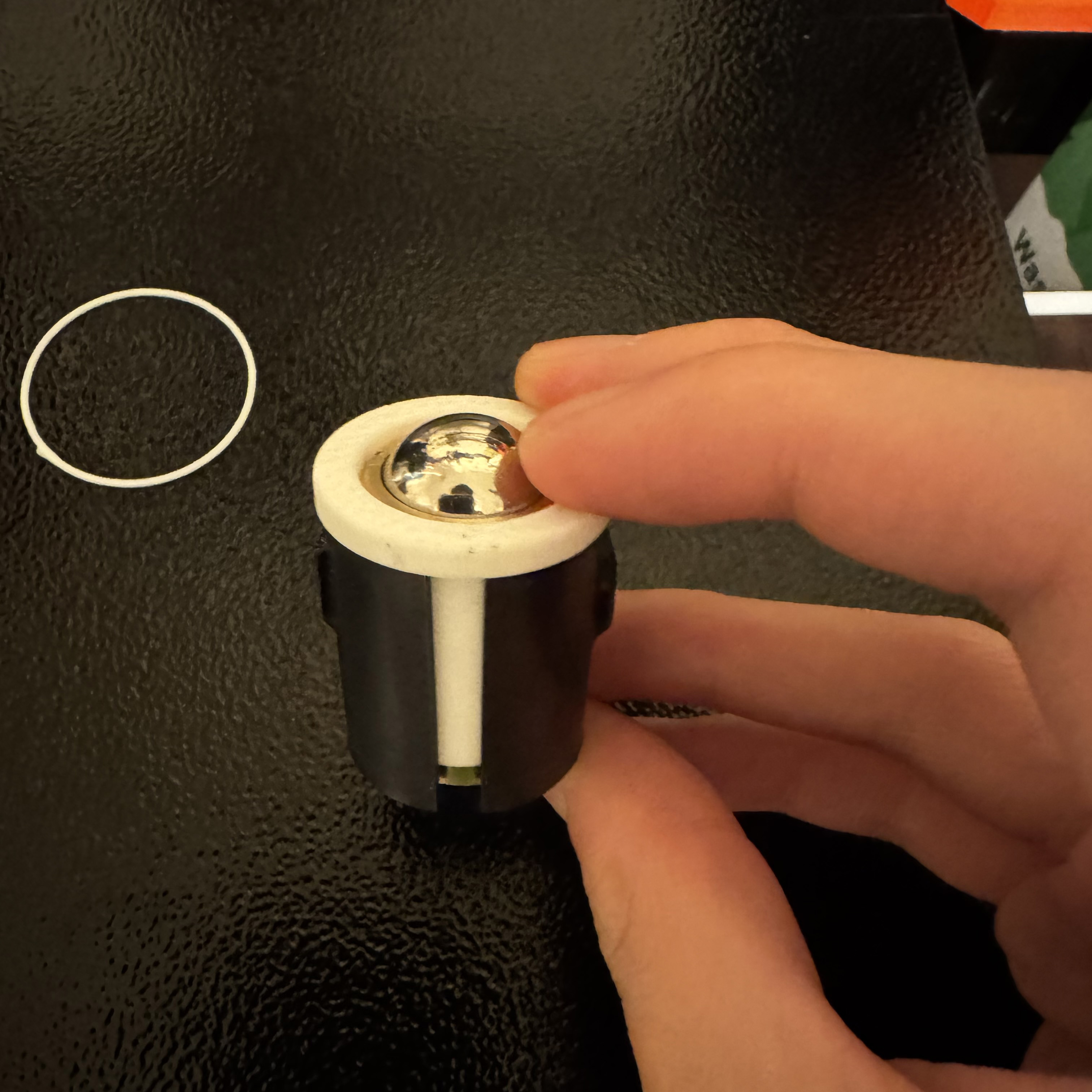 Finished product of the door holder from the 3D printer.